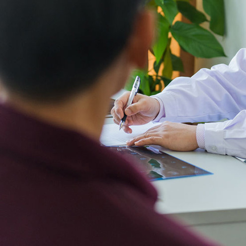 Person discussing donor sperm at doctors